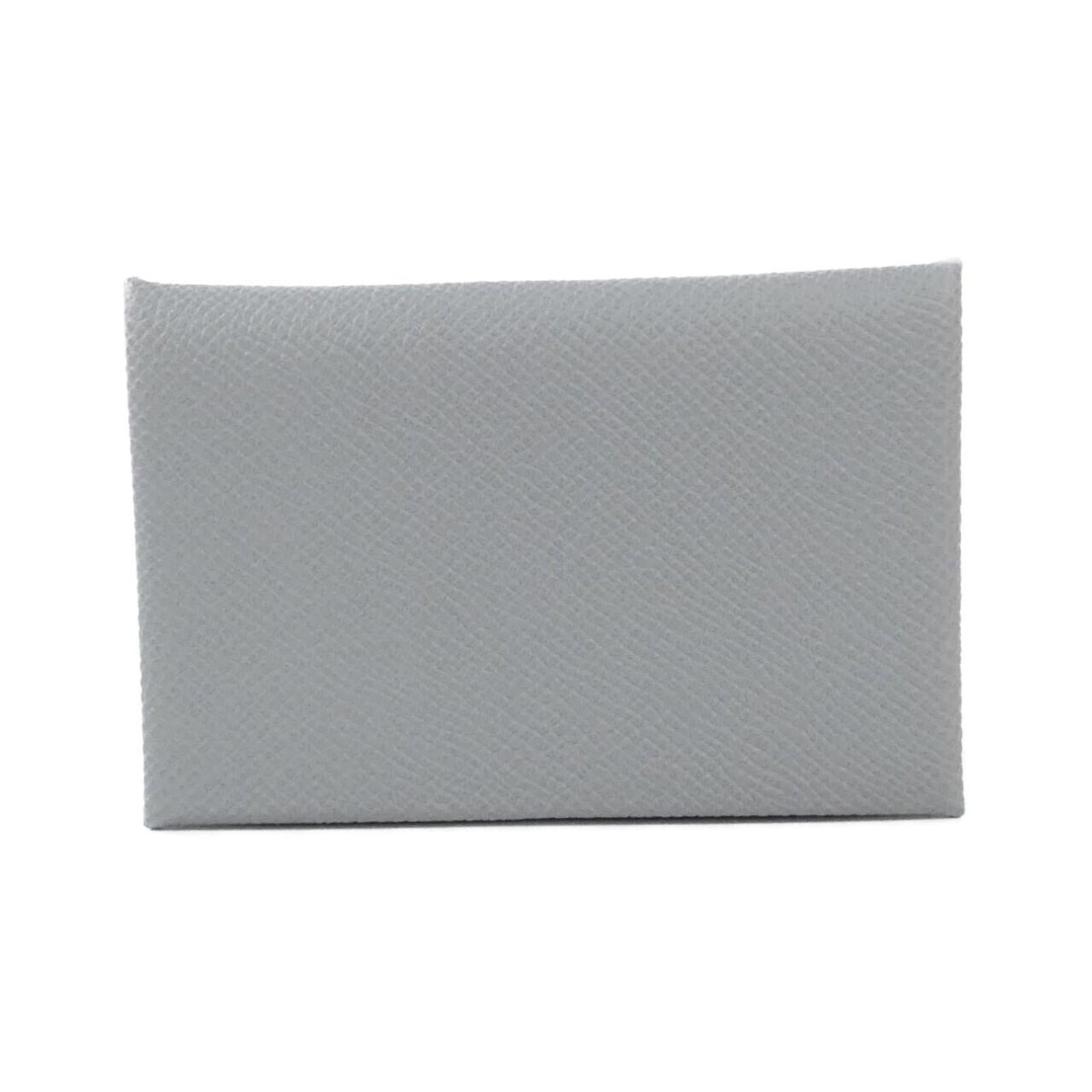 Epsom leather card case from Hermes: Epsom leather card case from Hermes Epsom leather card case from Hermes, featuring a subtle and sophisticated design. Made from high-quality Epsom leather with a few traces of usage visible, this