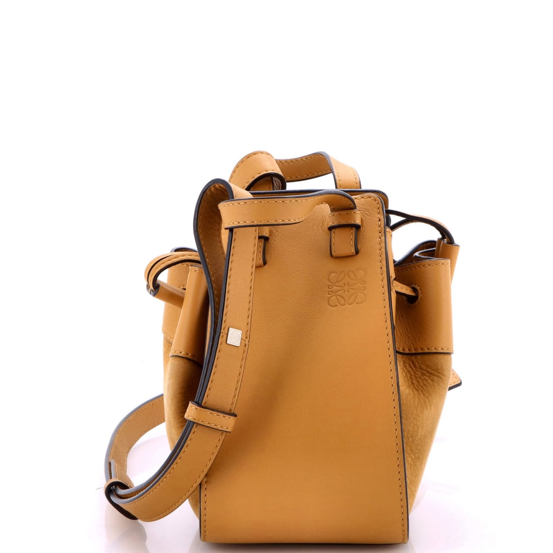 Hammock Bag Leather Suede Mini Loewe: Hammock Bag Leather Suede Mini Loewe This Brown Leather Suede Mini Loewe Hammock Bag features a stylish combination of leather and suede materials, with a neutral interior and silver hardware. The