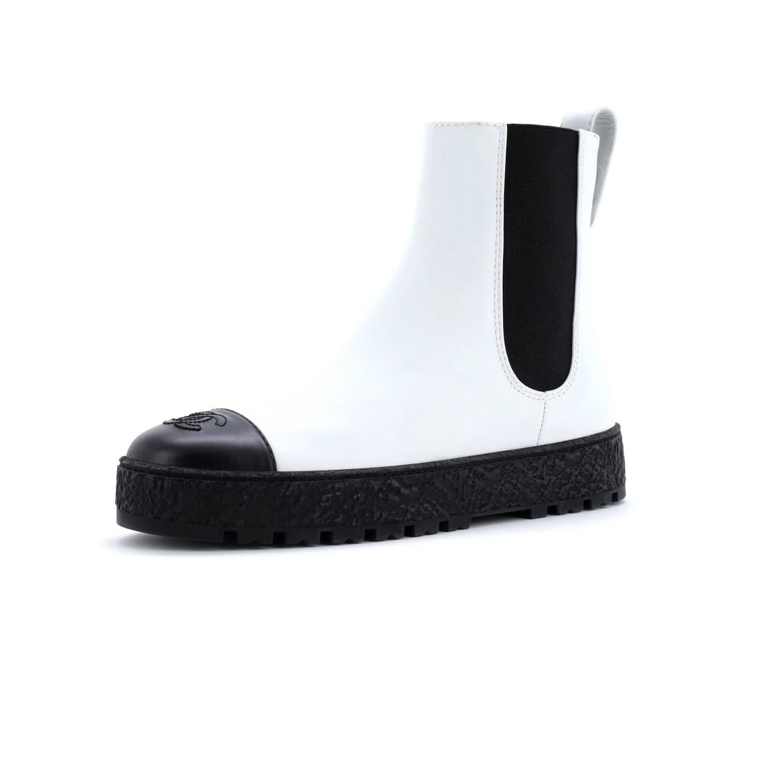 Chanel Women's CC Turnlock Leather Cap Toe Chelsea Boots: Chanel Women's CC Turnlock Leather Cap Toe Chelsea Boots White leather exterior with red interior, gold hardware, and cap toe design make these Chanel Women's CC Turnlock Chelsea Boots stand out.