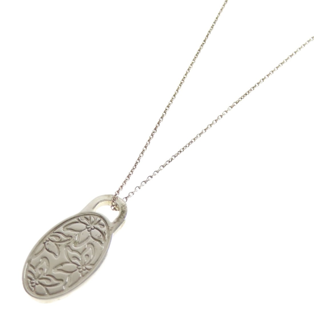 Tiffany&Co. Go Women Japanese Iris Necklace Silver: Tiffany&Co. Go Women Japanese Iris Necklace Silver Tiffany&Co.'s Go Women Japanese Iris Necklace in silver features a sleek and modern design. This 15.7-inch necklace boasts a striking exterior color 