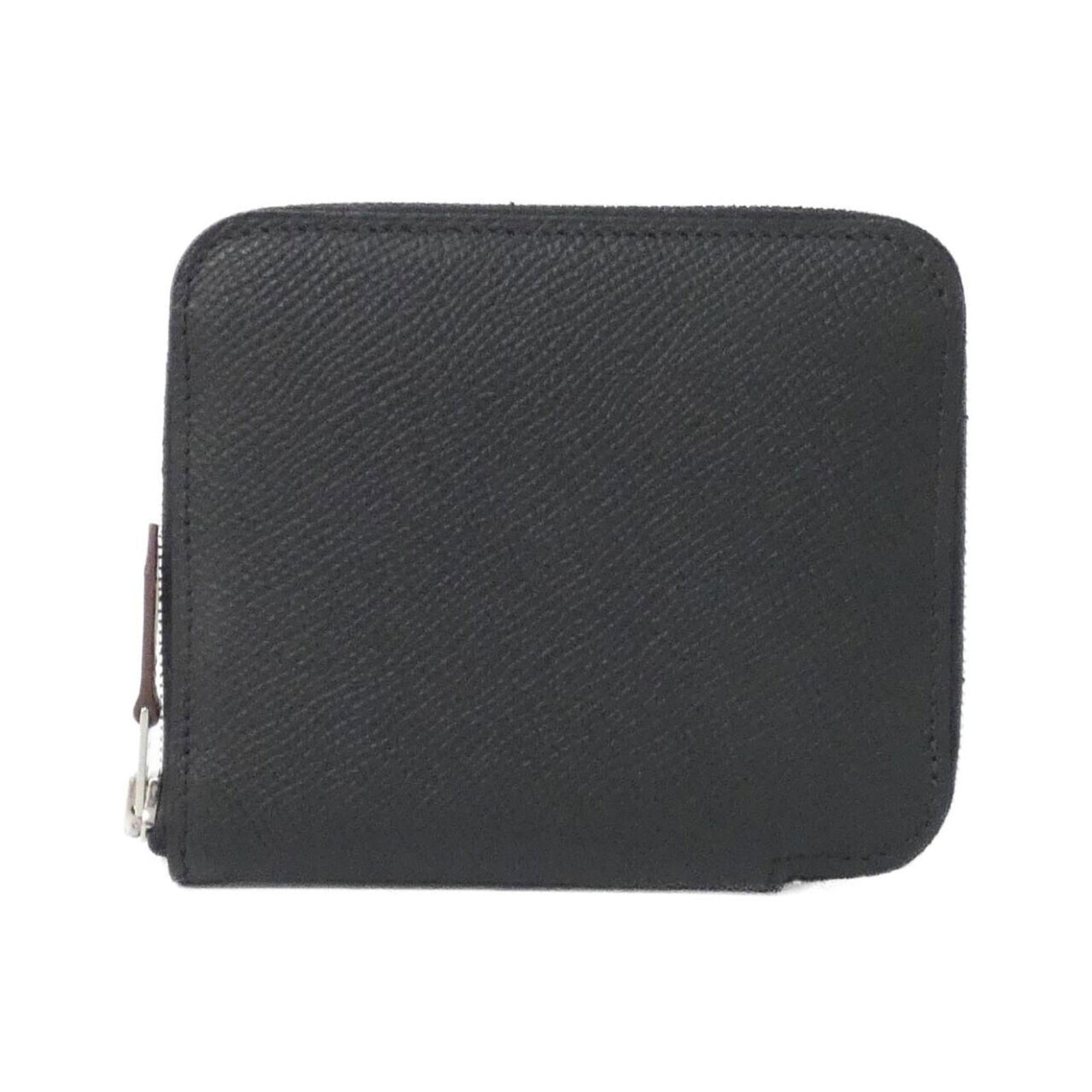 Epsom Leather Silk Bi Fold Wallet Hermes: Epsom Leather Silk Bi Fold Wallet Hermes Epsom Leather Silk Bi Fold Wallet from Hermes, featuring a classic bi-fold design with Epsom leather and silk accents in black. The wallet has some minor scrat