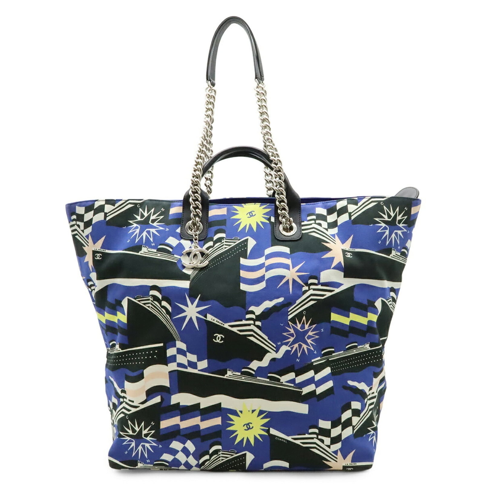Shoulder bag tote canvas by Chanel: Shoulder bag tote canvas by Chanel Black, blue, and multi-color canvas shoulder bag tote with classic Chanel design. This versatile tote measures 41.5cm x 32.5cm x 20.5cm and features a few traces of 