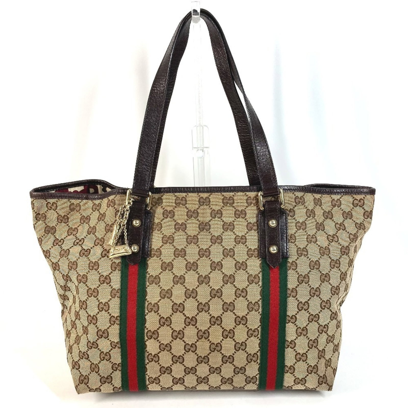 Gucci Shoulder Bag Tote Bag Gg Canvas Leather: Gucci Shoulder Bag Tote Bag Gg Canvas Leather The Gucci Shoulder Bag Tote Bag features a unique combination of Gg Canvas and Leather materials, providing a stylish and durable design. With its classic