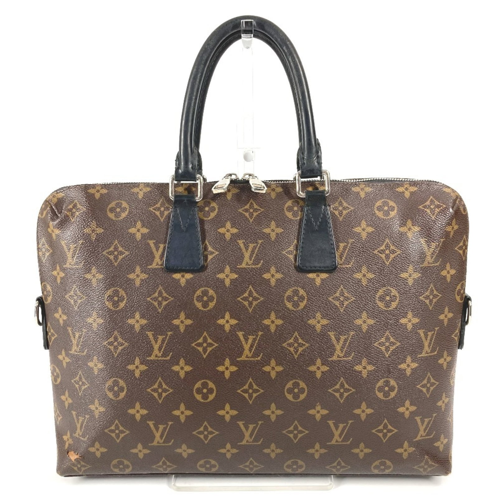Canvas Handbag Monogram Louis Vuitton: Canvas Handbag Monogram Louis Vuitton Canvas Handbag Monogram Louis Vuitton - A timeless piece with a classic design, featuring the iconic monogram pattern in black and brown hues. This canvas handbag