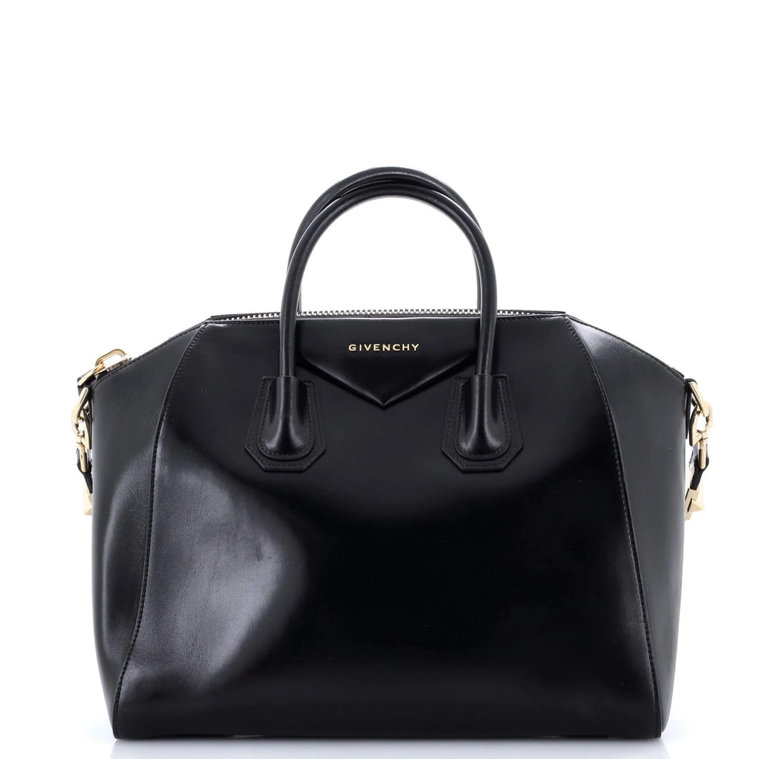 Glazed leather medium bag from Givenchy: Glazed leather medium bag from Givenchy The Givenchy Antigona Glazed Leather Medium Bag boasts sleek, sophisticated design with its black exterior and aged gold hardware. This medium-sized bag