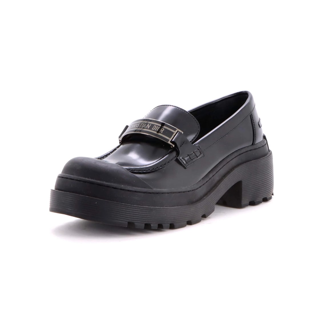 Christian Dior Women's Code Platform Leather Loafers: Christian Dior Women's Code Platform Leather Loafers Black leather platform loafers with silver hardware, featuring a classic design and subtle scuffs throughout. The interior boasts black leather lin