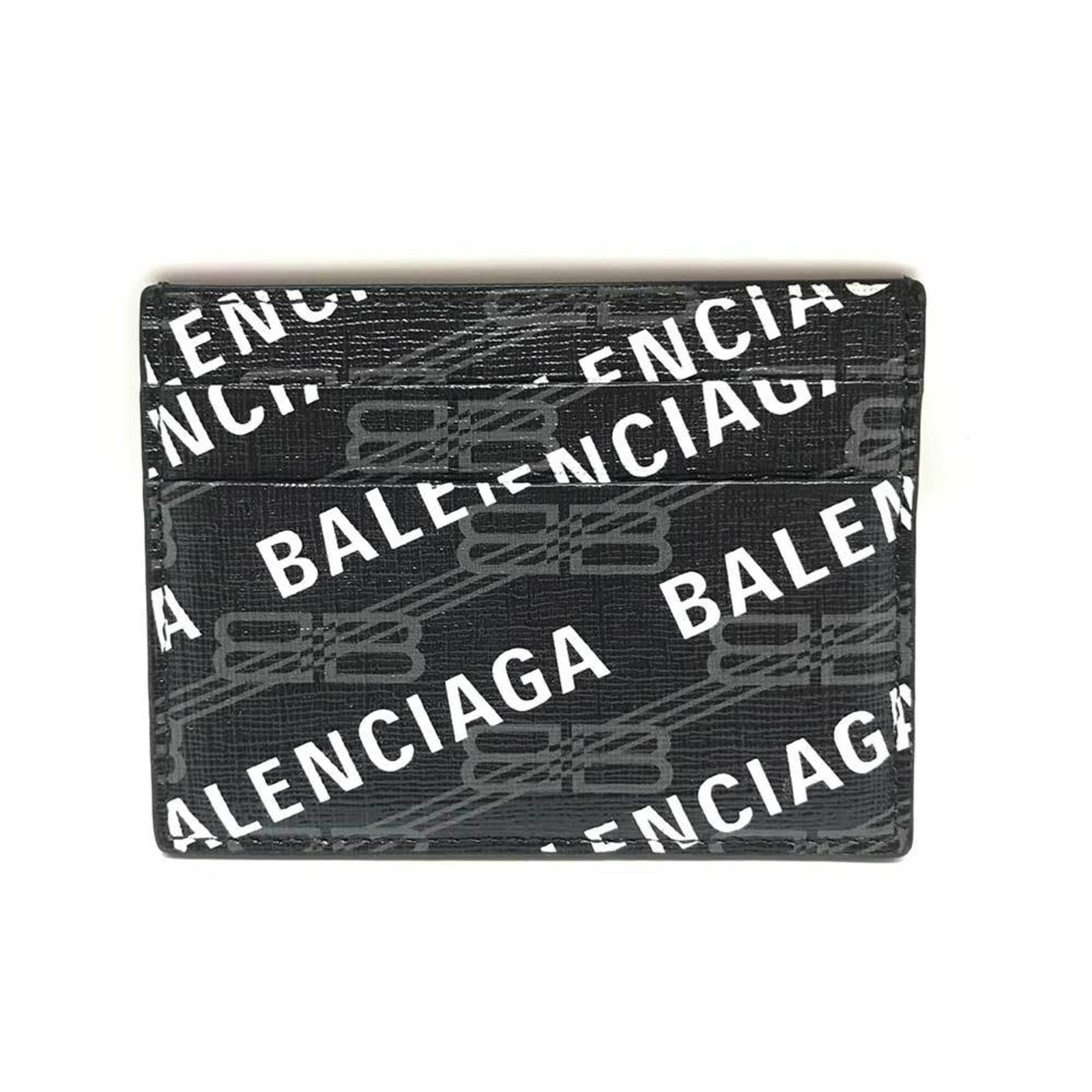Card case in leather by Balenciaga: Card case in leather by Balenciaga This Balenciaga leather card case boasts sleek, understated design with a rich black finish. Featuring high-quality leather construction, it showcases subtle signs