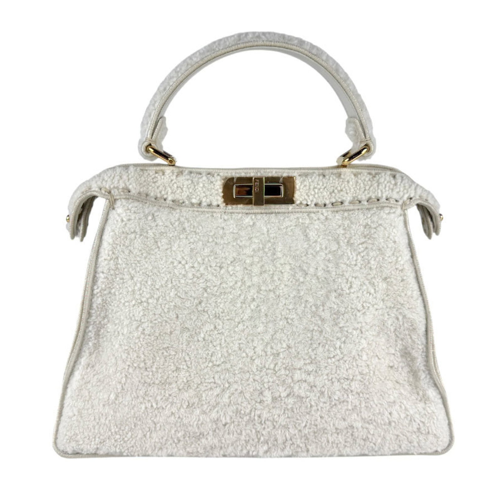 Shoulder bag from Fendi: Shoulder bag from Fendi White Fendi shoulder bag with a classic design, featuring a timeless combination of clean lines and elegant proportions. The bag's condition shows some minor signs of usage, in