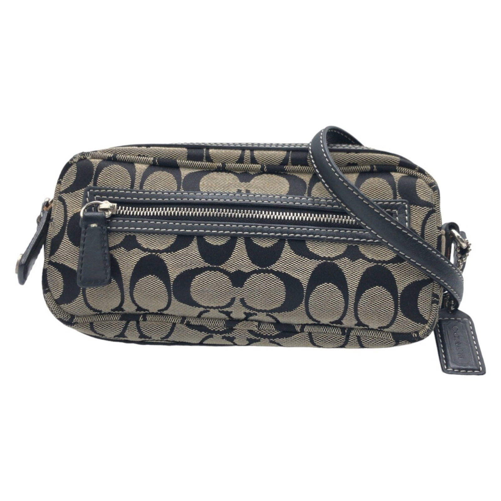 Signature Line Pochette Shoulder Coach Bag: Signature Line Pochette Shoulder Coach Bag Signature Line Pochette Shoulder Coach Bag in black, bearing a signature. This pochette shoulder bag measures 11cm x 21cm x 4cm and features the iconic Coach