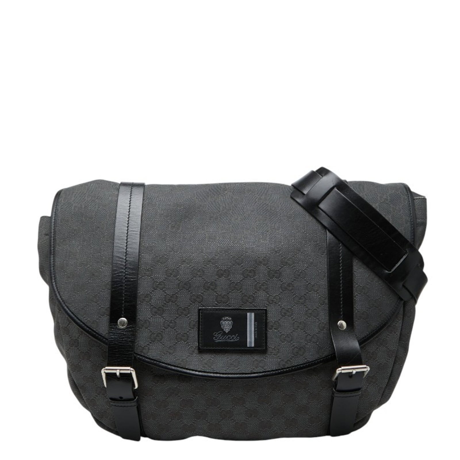 Canvas leather messenger bag shoulder bag: Canvas leather messenger bag shoulder bag Canvas leather messenger bag with classic shoulder strap, bearing the Gucci brand and signature. This versatile bag features a durable canvas exterior and