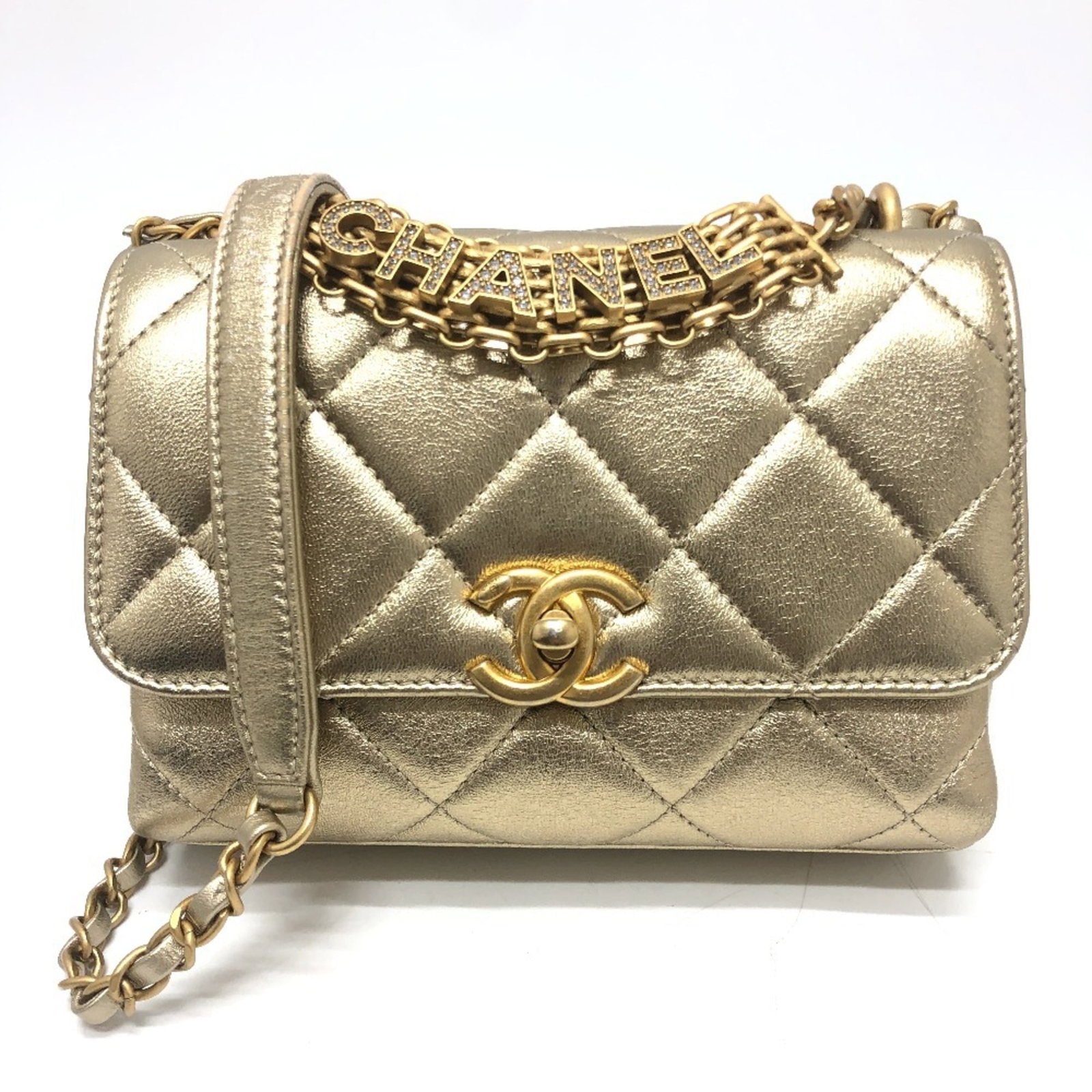 Chanel Handbag Shoulder Bag Leather: Chanel Handbag Shoulder Bag Leather The iconic Chanel Handbag Shoulder Bag Leather boasts its signature lambskin material and gold hardware, exuding timeless elegance. With its classic design and stur