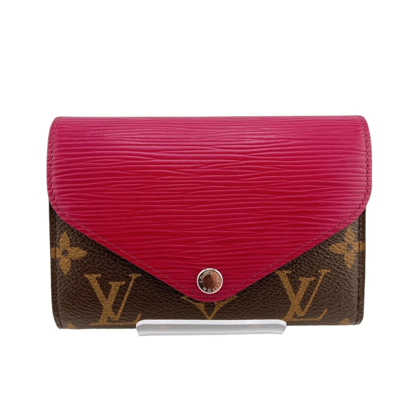 Monogram Epi Leather Tri Fold Louis Vuitton: Monogram Epi Leather Tri Fold Louis Vuitton The Monogram Epi Leather Tri Fold Louis Vuitton features a striking fuchsia color and iconic monogram pattern, adding a touch of elegance to any outfit. Mad