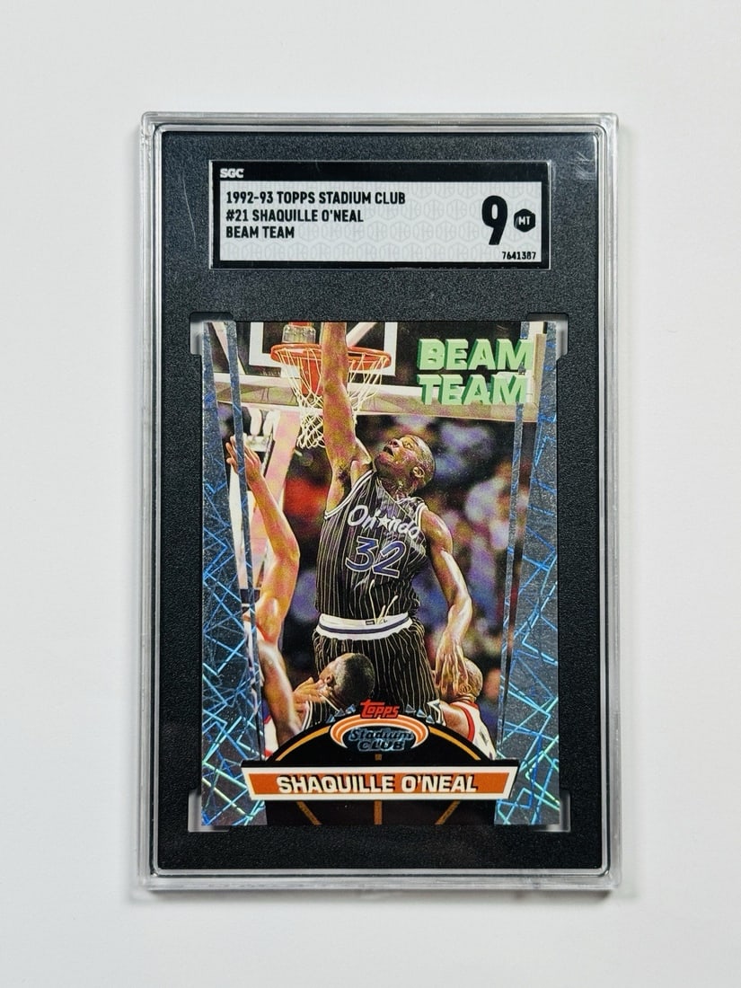 SHAQUILLE O'NEAL 1992 93 BEAM TEAM SGC TOPPS STADIUM CLUB #21: SHAQUILLE O'NEAL 1992 93 BEAM TEAM SGC TOPPS STADIUM CLUB #21 The 1992-93 Topps Stadium Club #21 card features rookie insert Shaquille O'Neal in his early NBA career, showcasing the dominant center's