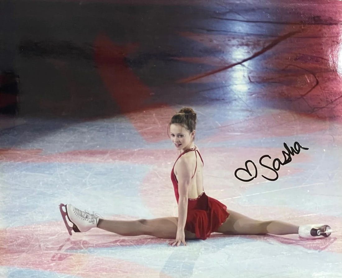 Celebrity Autographed Photo Sasha Cohen 8x10: Celebrity Autographed Photo Sasha Cohen 8x10 Sasha Cohen's 8x10 photo bears her signature in black sharpie across the front, making for a unique and intriguing piece. This celebrity autographed photo