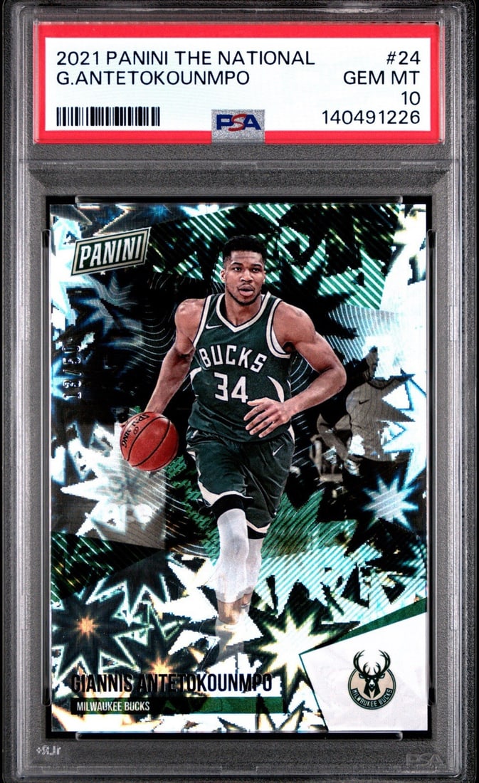 GIANNIS ANTETOKOUNMPO #24 KABOOM EXPLOSION/ 2021 PANINI 50 PSA 10: GIANNIS ANTETOKOUNMPO #24 KABOOM EXPLOSION/ 2021 PANINI 50 PSA 10 PSA 10 graded, the 2021 Panini The National features Giannis Antetokounmpo #24 in near-perfect condition. This Explosion parallel boas