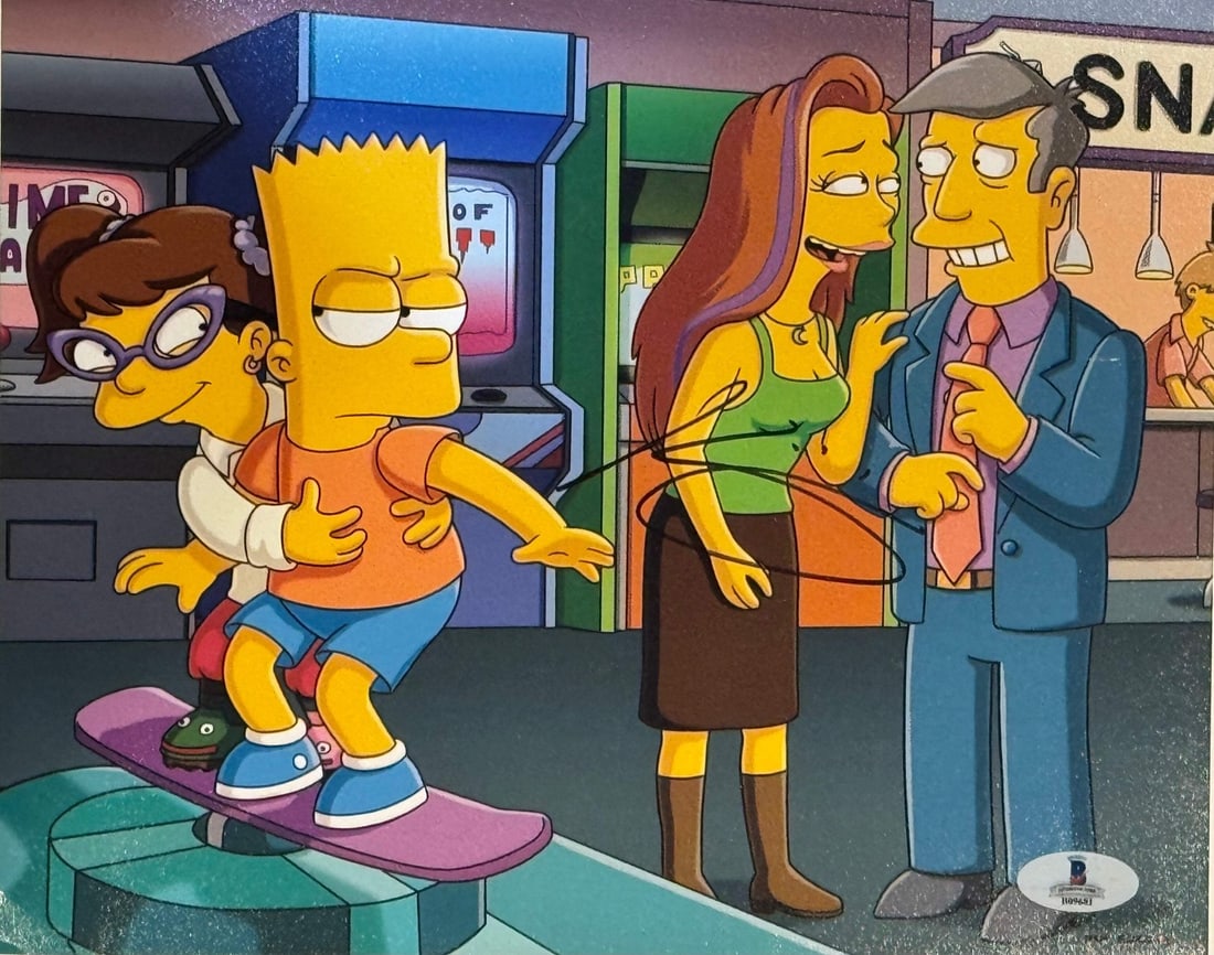 Kristen Wiig The Simpsons Autographed 8x10 Celebrity Photo (Beckett): Kristen Wiig The Simpsons Autographed 8x10 Celebrity Photo (Beckett) 8x10 celebrity photo signed in blue sharpie by Kristen Wiig across the front, featuring her iconic likeness from The Simpsons.