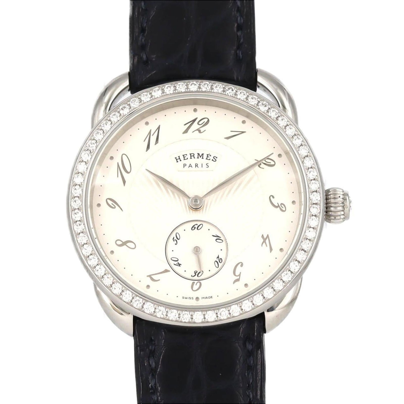 Hermes Wristwatch: Hermes Wristwatch Stainless steel case with a silver dial, the Hermes wristwatch boasts a classic design. Measuring 34mm in diameter, it presents a subtle yet elegant presence on the wrist. With some 