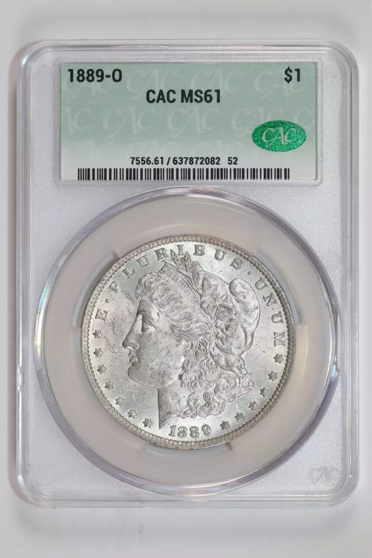 1889-O MORGAN DOLLAR CACG MS61: 1889-O MORGAN DOLLAR CACG MS61 The 1889-O Morgan Dollar CAC MS61 boasts a rich history, certified by the Coin Authentication Corporation (CAC), with its silver composition and high grade of MS 61.