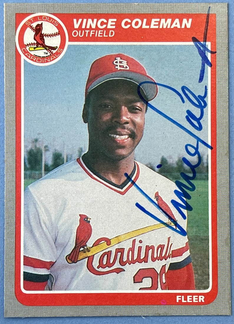 Vince Coleman Autographed 1985 Fleer Rookie Card #U28: Vince Coleman Autographed 1985 Fleer Rookie Card #U28 Vince Coleman's 1985 Fleer Rookie Card #U28 features his sharpie signature across the front, adding a unique touch to this vintage baseball