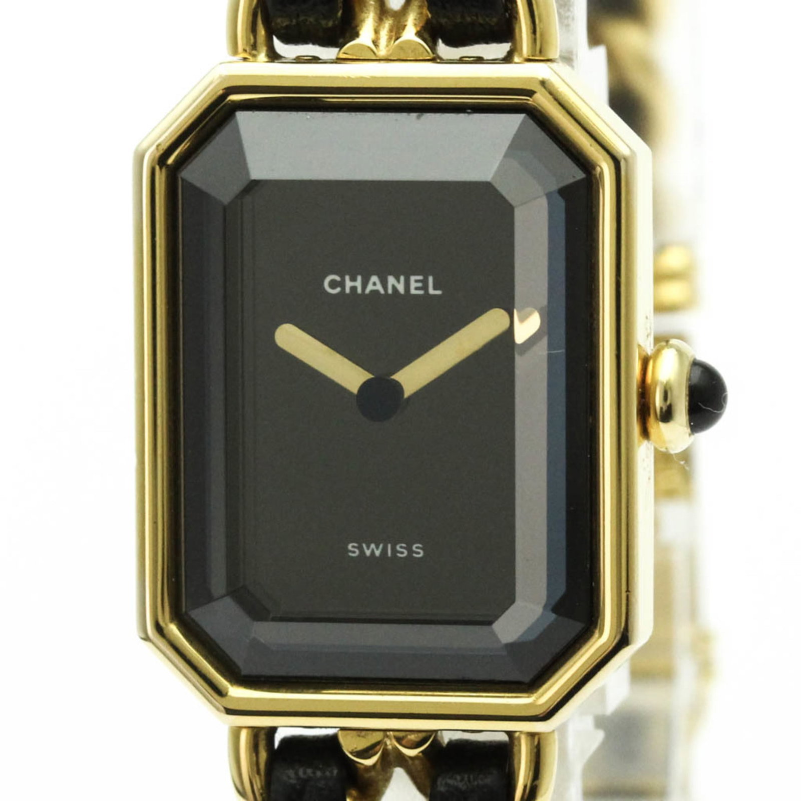 Chanel Wristwatch: Chanel Wristwatch Gold plated Chanel wristwatch with black dial and gold plated leather band, featuring a classic dress/formal style. The watch has a 20mm case diameter and bears traces of usage, scra