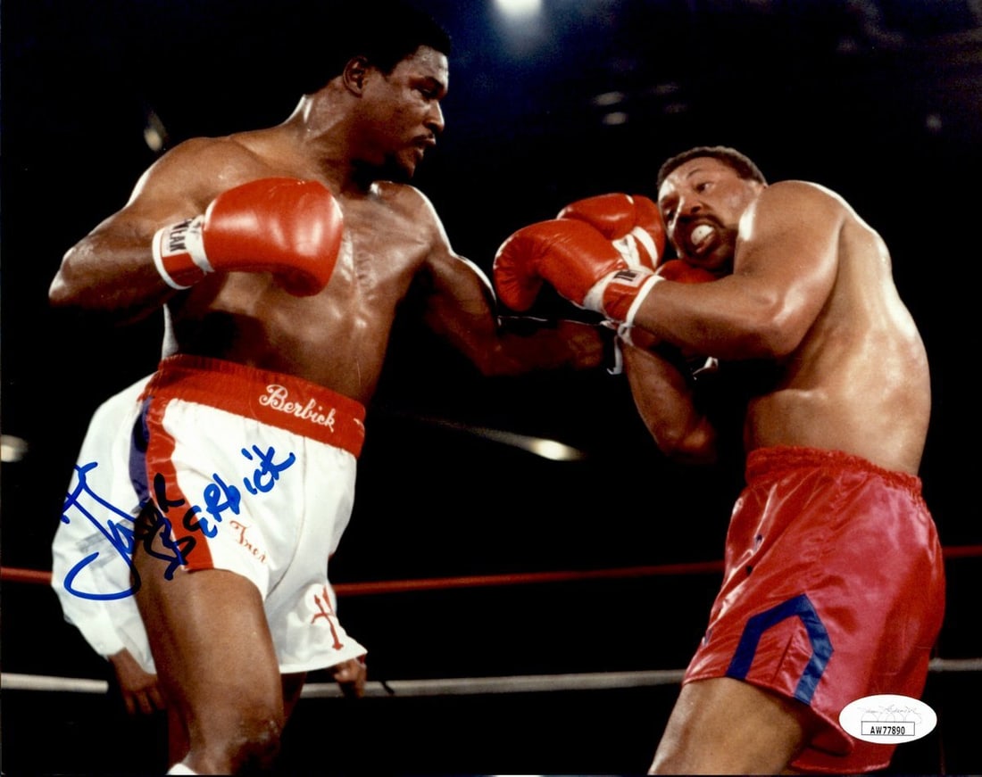 Trevor Berbick Signed Boxing Photo 8x10 Autographed By JSA: Trevor Berbick Signed Boxing Photo 8x10 Autographed By JSA Trevor Berbick's imposing presence in the boxing ring is captured in this official 8x10 photo, signed by the legendary boxer himself. The