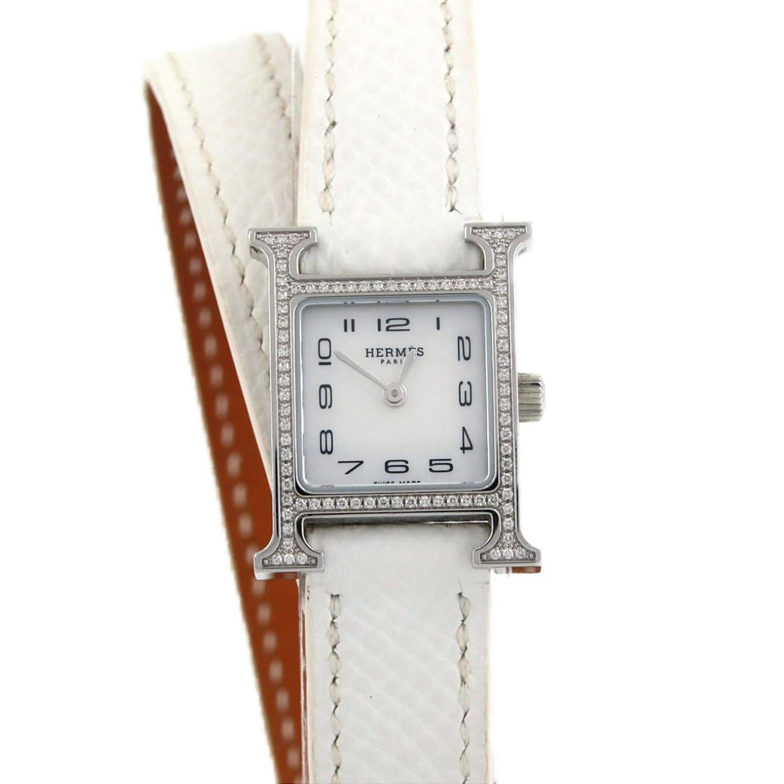 Hermes Wristwatch: Hermes Wristwatch Stainless steel case with mother of pearl dial, this Hermes wristwatch boasts a classic design. The watch's 17mm diameter and used condition add to its unique charm, with some traces