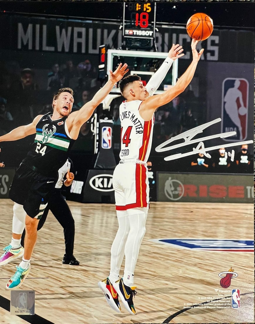 Tyler Herro Autographed Shooting 8x10 Basketball Photo (JSA): Tyler Herro Autographed Shooting 8x10 Basketball Photo (JSA) Tyler Herro's sharp shooting skills are on full display in this unique 8x10 basketball photo, signed in silver sharpie across the front.