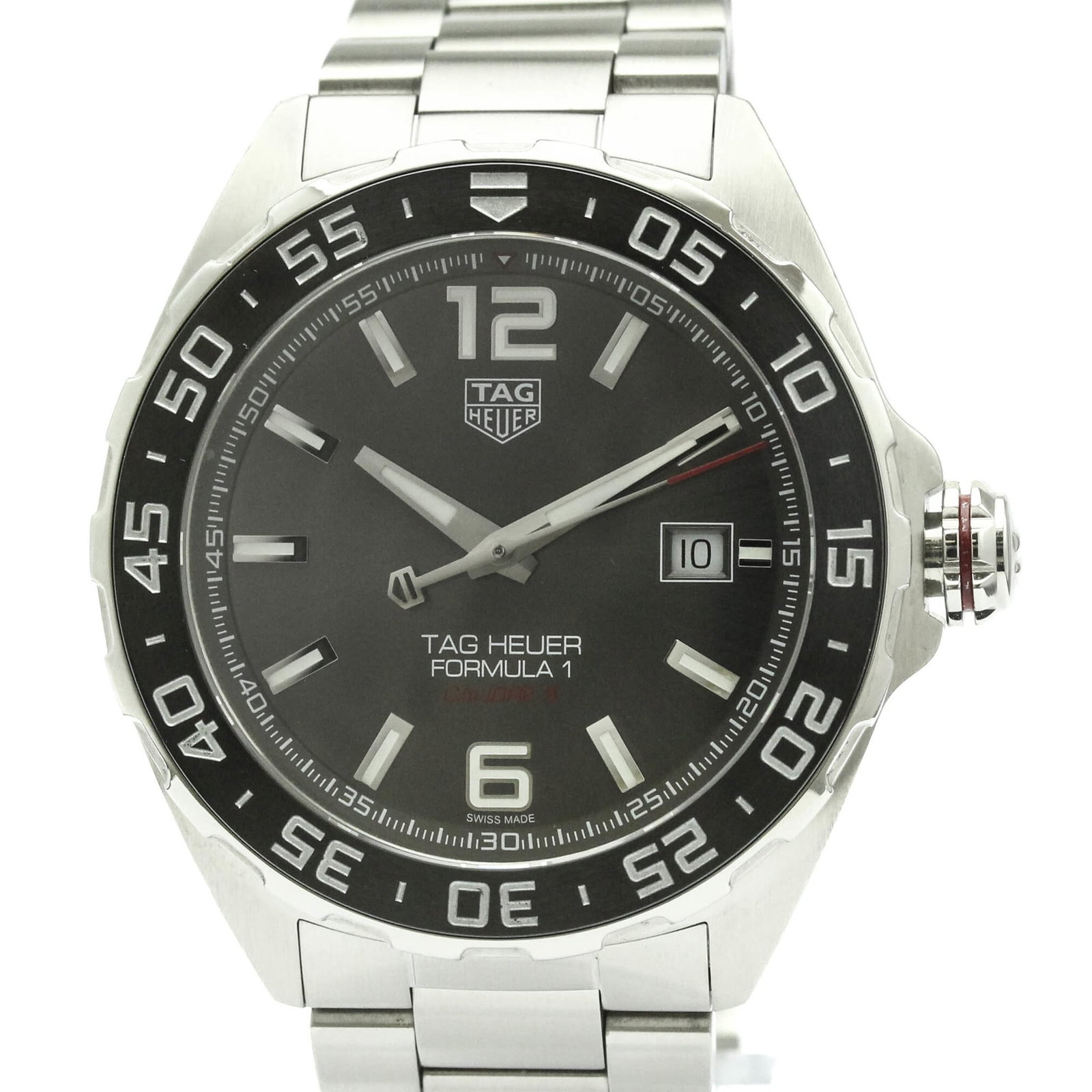 Tag Heuer Wristwatch: Tag Heuer Wristwatch Ceramic and stainless steel construction gives this Tag Heuer wristwatch its sporty edge, with a sleek black dial and durable materials that can withstand everyday wear. The 43mm 