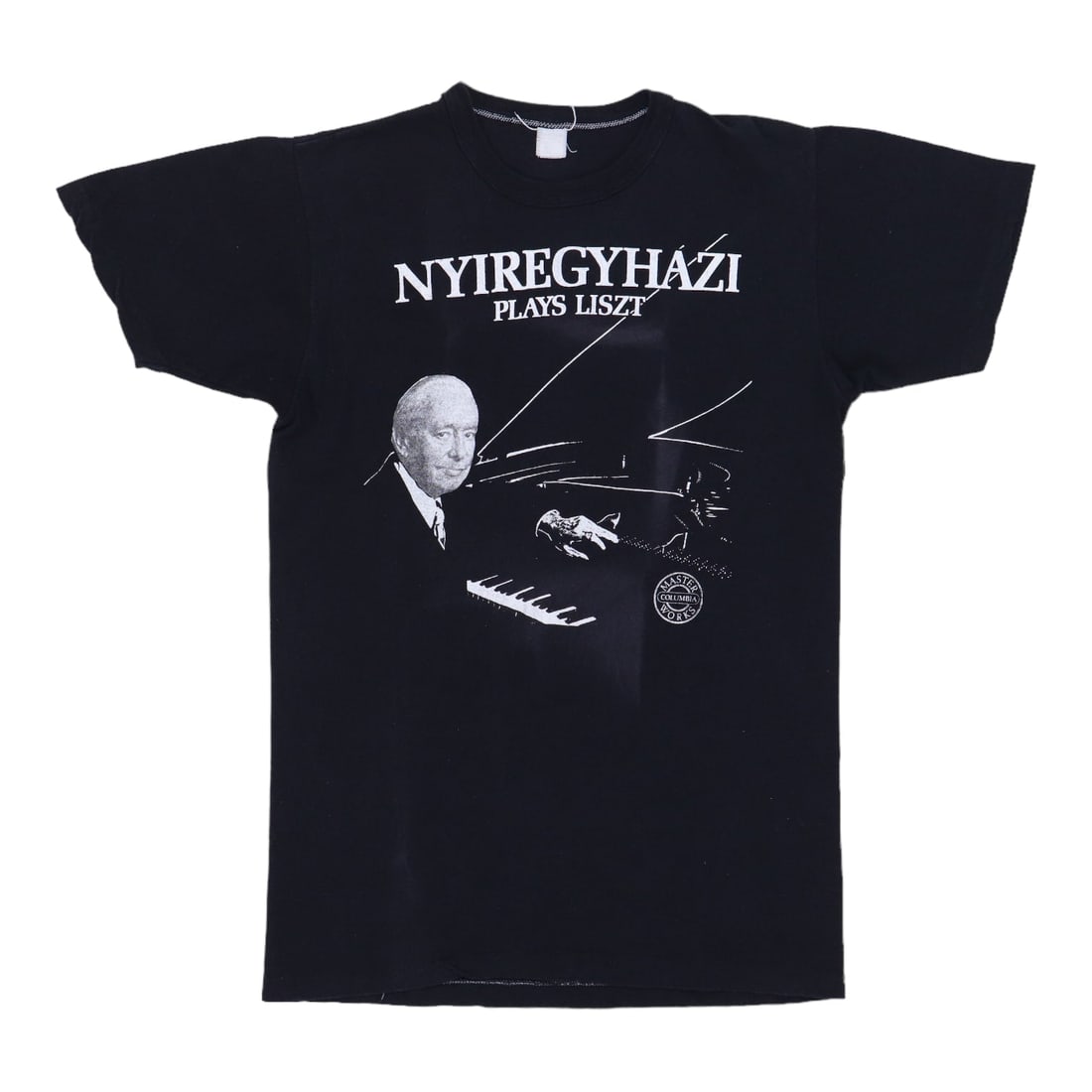 Shirt plays Liszt ervin Nyiregyhzi 1970s: Shirt plays Liszt ervin Nyiregyhzi 1970s Black 100% cotton shirt from the 1970s featuring front and back graphics. The Ervin Nyiregyhzi Plays Liszt design is a unique vintage find, with varying sizes 