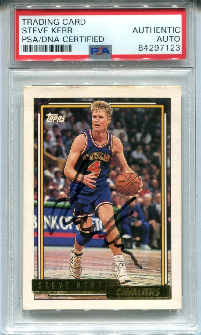 Steve Kerr Autographed 1992 Topps Card (PSA): Steve Kerr Autographed 1992 Topps Card (PSA) Steve Kerr's sharpie signature across the front of his 1992 Topps card adds an unmistakable touch to this vintage collectible. Certified by Professional