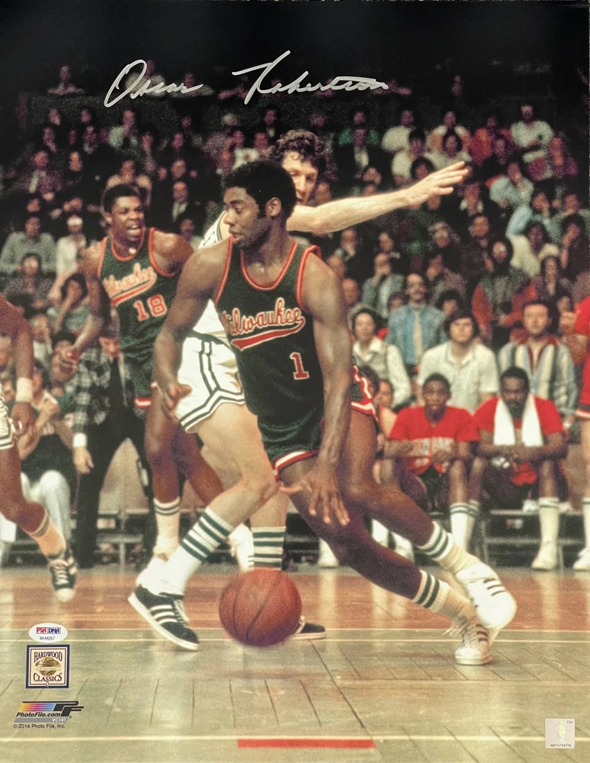 Oscar Robertson Autographed 16x20 Basketball Photo (PSA): Oscar Robertson Autographed 16x20 Basketball Photo (PSA) Signed in silver sharpie across the front of the photo, Oscar Robertson's signature adds a touch of NBA legend to this 16x20 basketball photo.