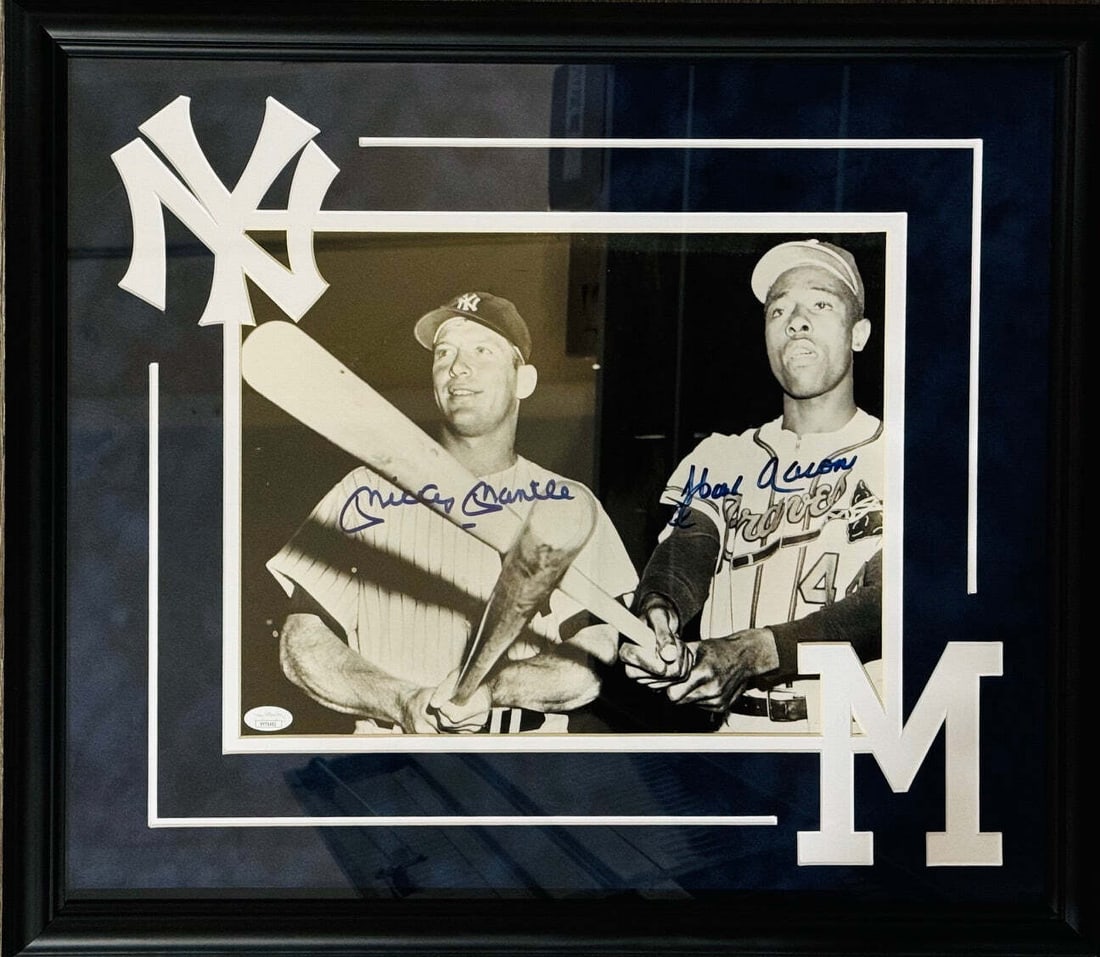 Mickey Mantle Hank Aaron Autographed Framed 11x14 Photo (JSA): Mickey Mantle Hank Aaron Autographed Framed 11x14 Photo (JSA) Signed in blue sharpie across the front of an 11x14 photo, this framed item bears the signatures of baseball legends Mickey Mantle and