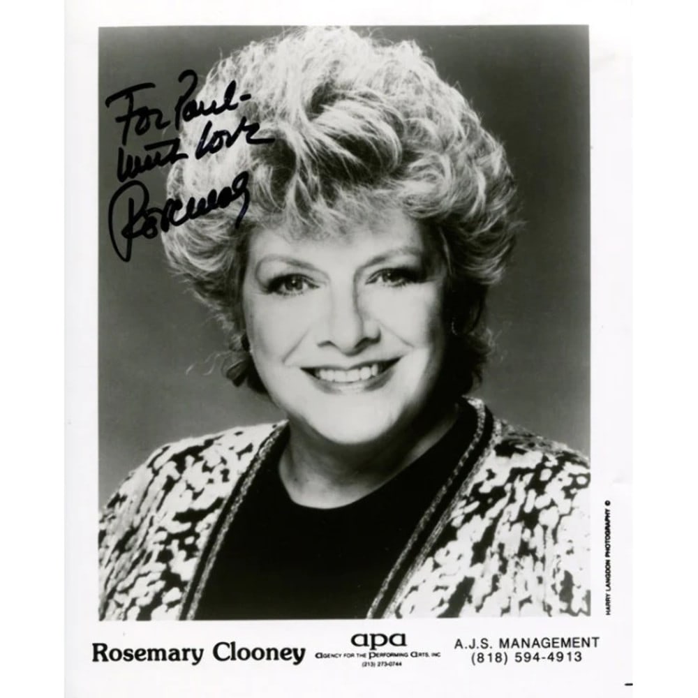 Clooney Autographed Rosemary 8x10 Photo: Clooney Autographed Rosemary 8x10 Photo Rosemary Clooney's iconic smile shines bright in this 8x10 photo, signed in black sharpie by the legendary singer. The photo bears a personal touch, making it
