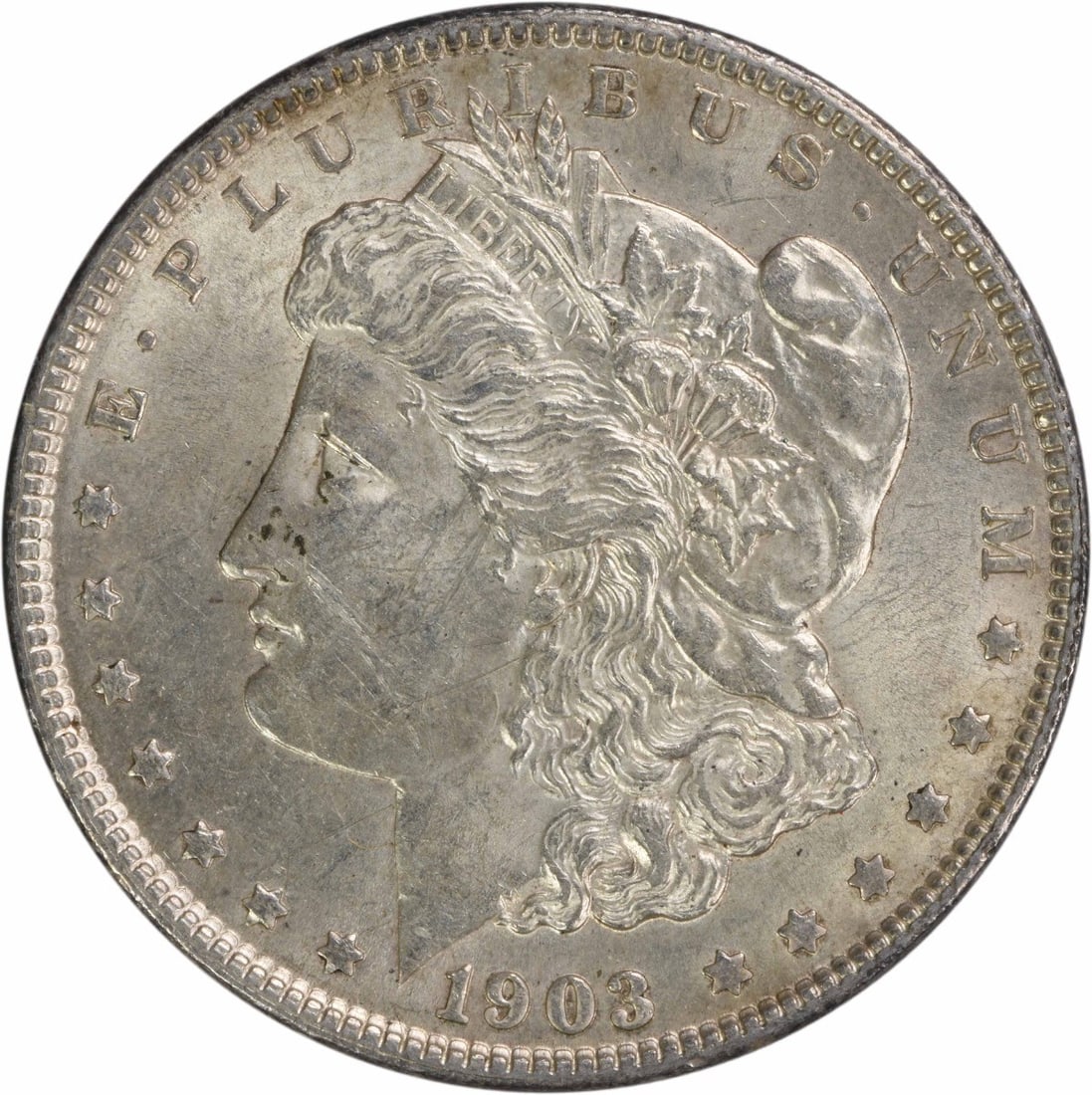 1903 Morgan Silver Dollar AU Slider Uncertified: 1903 Morgan Silver Dollar AU Slider Uncertified The 1903 Morgan Silver Dollar features an AU grade, indicating it has been carefully preserved in its circulated state. With its 90% silver and 10%