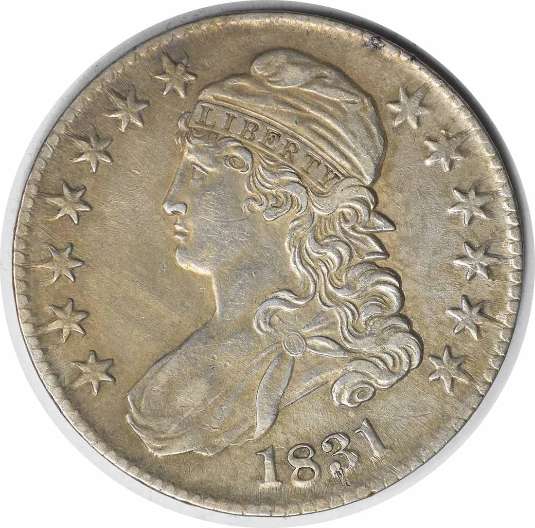 1831 Bust Half Dollar AU Uncertified: 1831 Bust Half Dollar AU Uncertified The 1831 Bust Half Dollar features a classic design by John Reich, with its lettered edge and distinctive diameter of 32.50 millimeters. This AU Uncertified coin