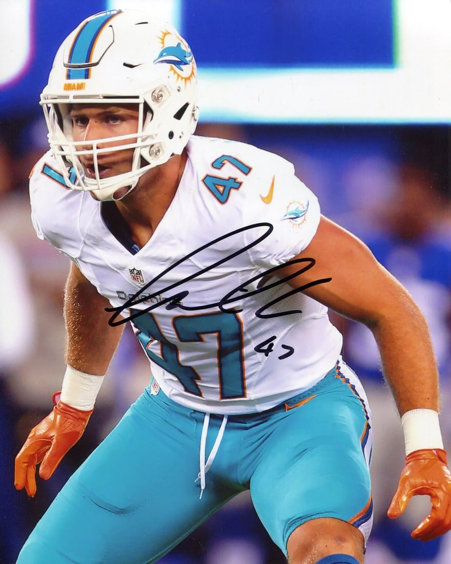 Alonso Kiko Autographed 8x10 Photo: Alonso Kiko Autographed 8x10 Photo Kiko Alonso's intense focus on the field is captured in this authentic 8x10 photo, signed in black sharpie across the front. The image showcases Alonso waiting for