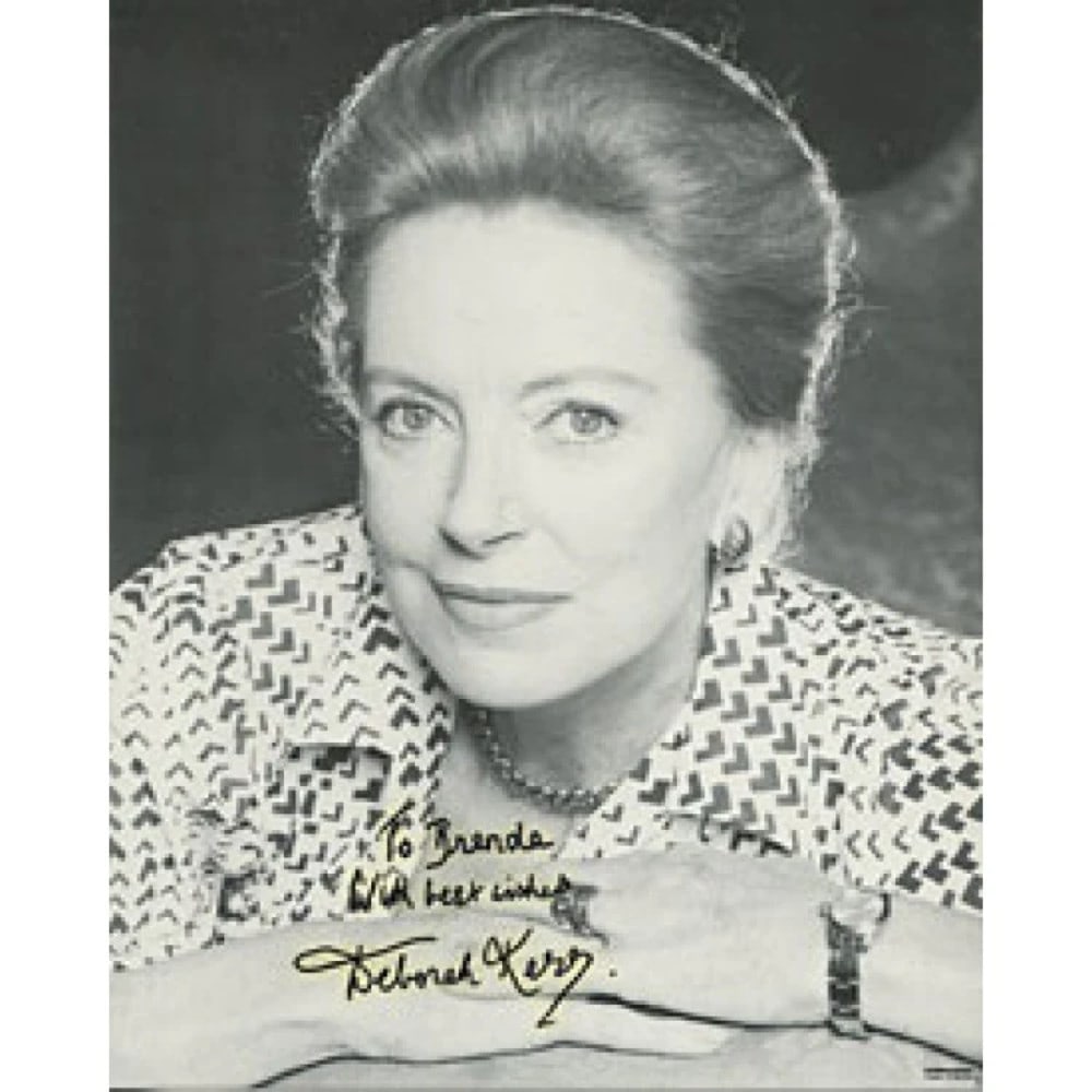 Deborah Kerr Autographed/ Signed 8x10 Photo: Deborah Kerr Autographed/ Signed 8x10 Photo Deborah Kerr's iconic face shines bright in this 8x10 signed photo, bearing her signature. A rare and nostalgic piece for film enthusiasts, this photograph