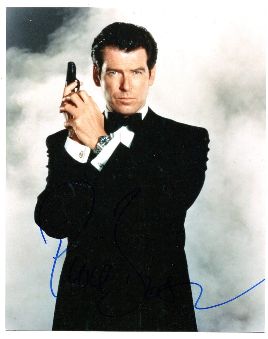 Celebrity Signed Photo 8x10 By Pierce Brosnan: Celebrity Signed Photo 8x10 By Pierce Brosnan Pierce Brosnan's blue sharpie signature adds a touch of elegance to this 8x10 celebrity photo, making it a unique and eye-catching addition to any