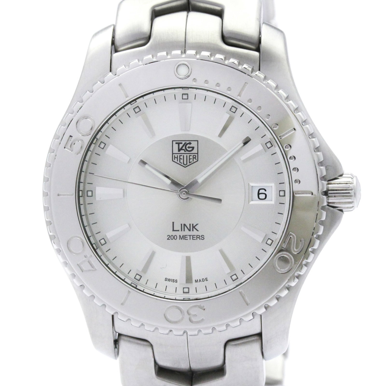 Tag Heuer Wristwatch: Tag Heuer Wristwatch Stainless steel case and band provide a durable foundation for this sporty watch, featuring a silver dial with a classic design. The 39mm diameter fits comfortably on most