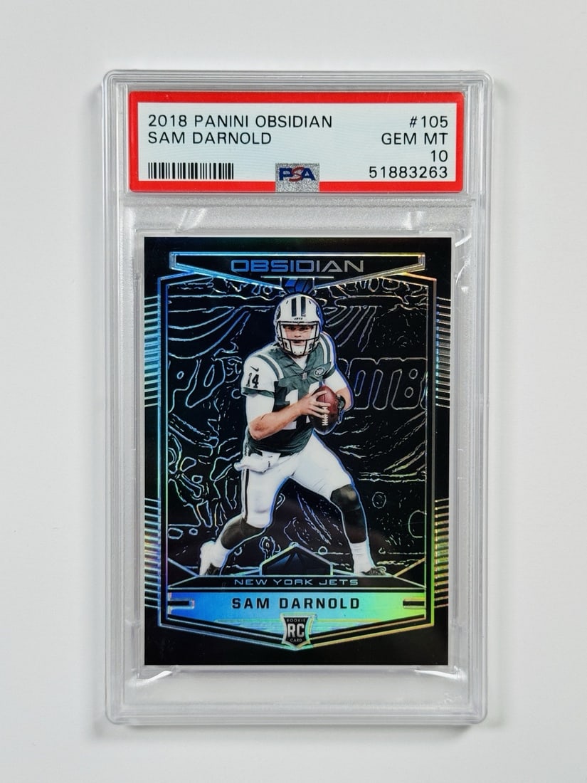 2018 PANINI OBSIDIAN SAM DARNOLD #105 ROOKIE/ 100 PSA 10: 2018 PANINI OBSIDIAN SAM DARNOLD #105 ROOKIE/ 100 PSA 10 Standard Autographed NFL Rookie Card Featuring Sam Darnold, Graded PSA 10. This highly sought-after card from the 2018 Panini Obsidian set