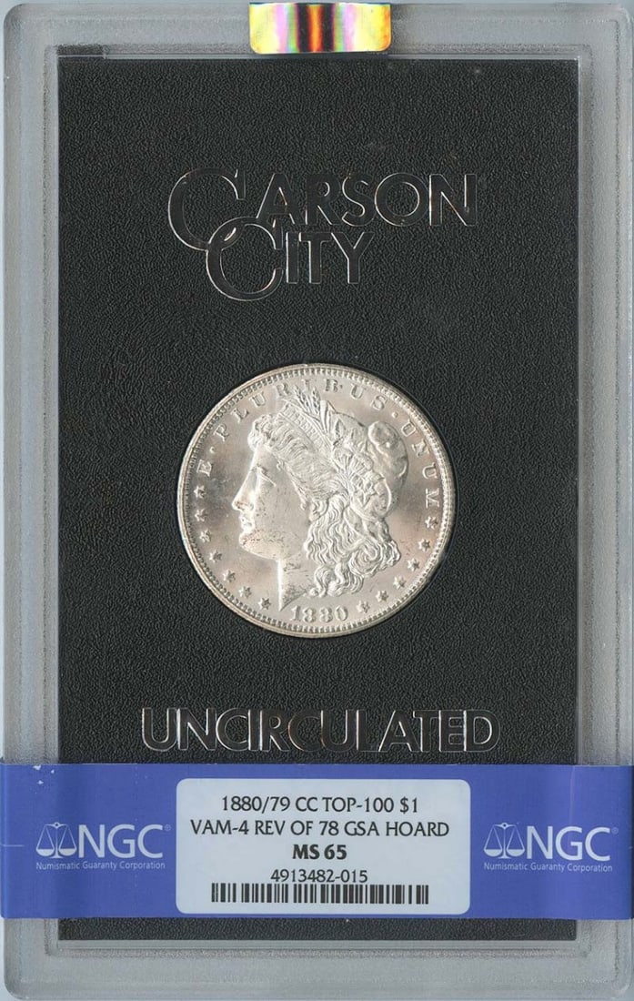 1880/ 79-CC VAM-4 REV 78 GSA HOARD S$1 NGC MS65 Morgan Dollar TOP-100: 1880/ 79-CC VAM-4 REV 78 GSA HOARD S$1 NGC MS65 Morgan Dollar TOP-100 MS65 GSA Hoard S$1 Morgan Dollar, certified by NGC with a high-grade score of 65. This top-100 coin features the 1880/79 date and