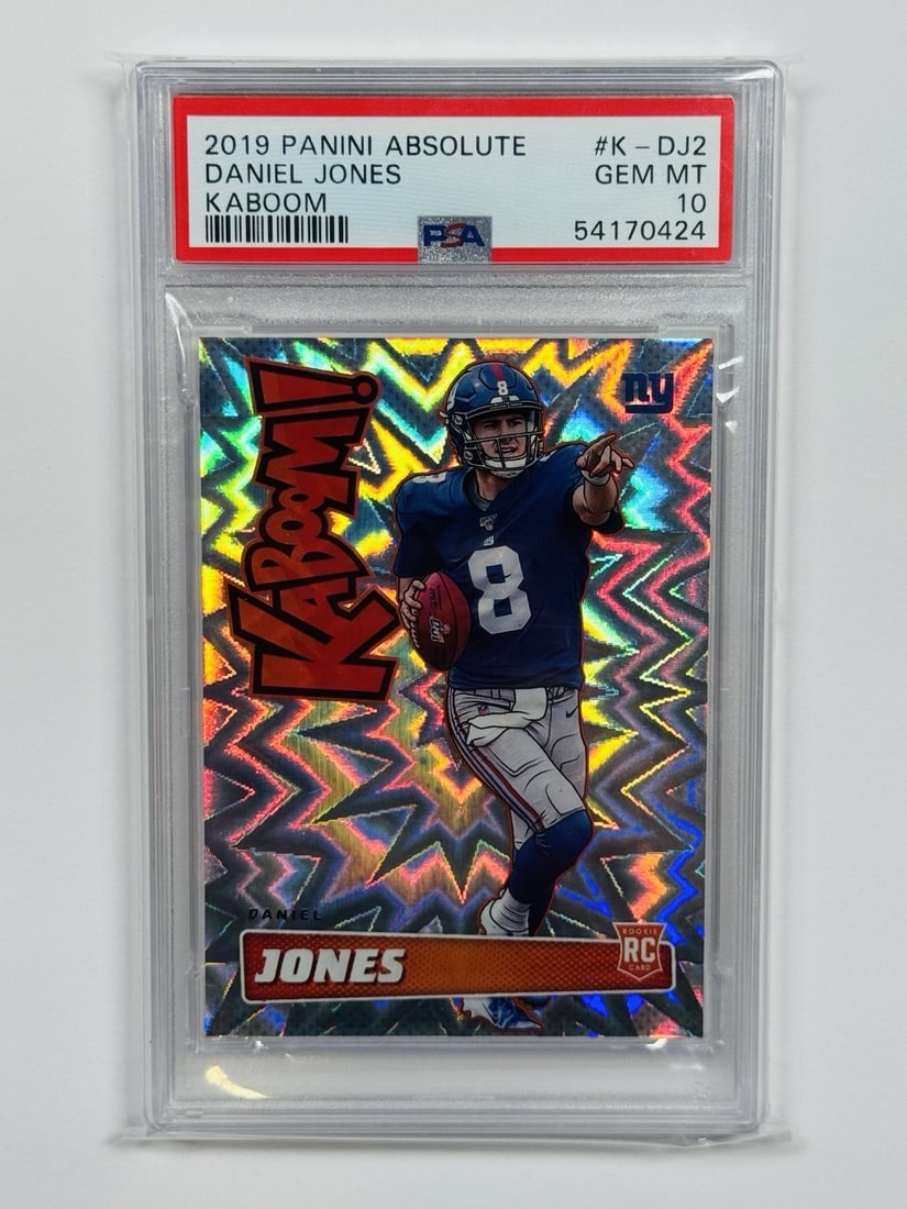 2019 PANINI ABSOLUTE DANIEL JONES #K-DJ2 KABOOM ROOKIE PSA 10: 2019 PANINI ABSOLUTE DANIEL JONES #K-DJ2 KABOOM ROOKIE PSA 10 PSA 10 graded, #K-DJ2 Kaboom! rookie card featuring Daniel Jones in his 2019 NFL debut. This highly sought-after card showcases the New