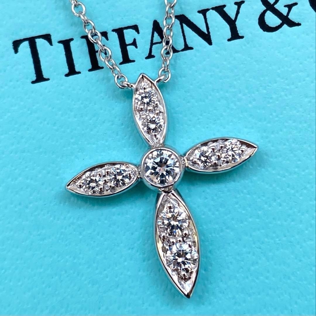 Vintage Tiffany & Co Small Illusion Cross Diamond Platinum 950 Necklace Pendant: Vintage Tiffany & Co Small Illusion Cross Diamond Platinum 950 Necklace Pendant Item Specifics: Pendant Shape: Cross Closure: Spring Ring Occasion: Anniversary Birthday Christening Christmas Confirmat