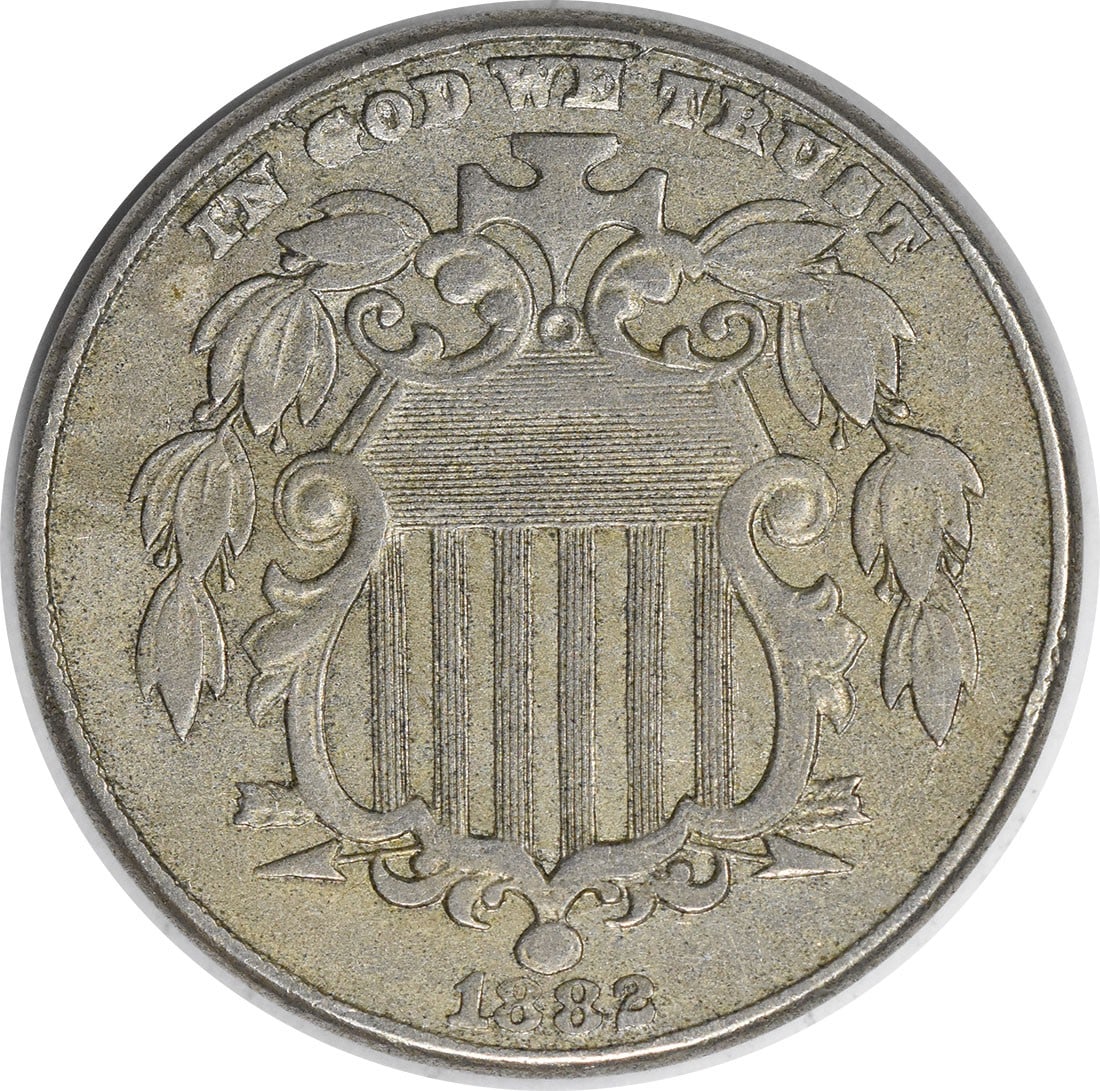 Shield Nickel 1882 AU Uncertified: Shield Nickel 1882 AU Uncertified The Shield Nickel, minted in 1882, boasts an impressive AU grade and circulated condition. With its distinctive design featuring James Barton Longacre's work, this