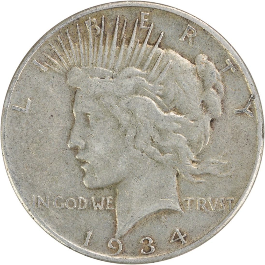 1934-S Peace Silver Dollar VF Uncertified: 1934-S Peace Silver Dollar VF Uncertified This 1934-S Peace Silver Dollar is a circulated coin with a high-grade VF condition, bearing the iconic design of Anthony de Francisci's Peace symbol. With
