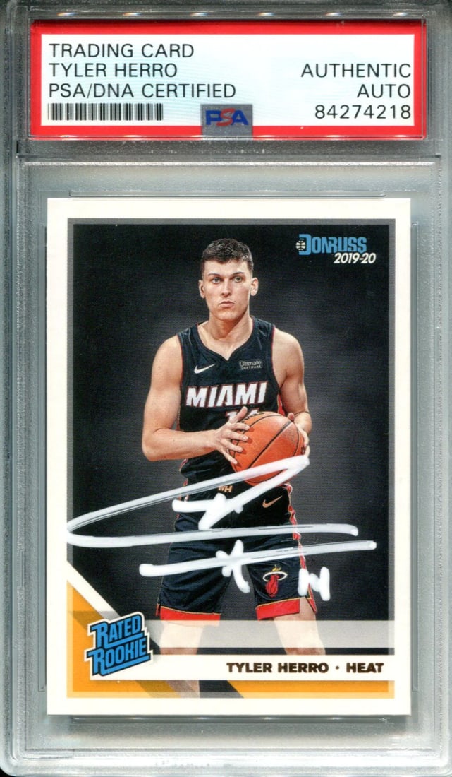 Herro Tyler PSA Autographed 2019 Donruss Rookie Card: Herro Tyler PSA Autographed 2019 Donruss Rookie Card Tyler Herro's rookie card from the 2019-20 Donruss set, authenticated and slabbed by PSA/DNA. The card features a white paint pen signature across