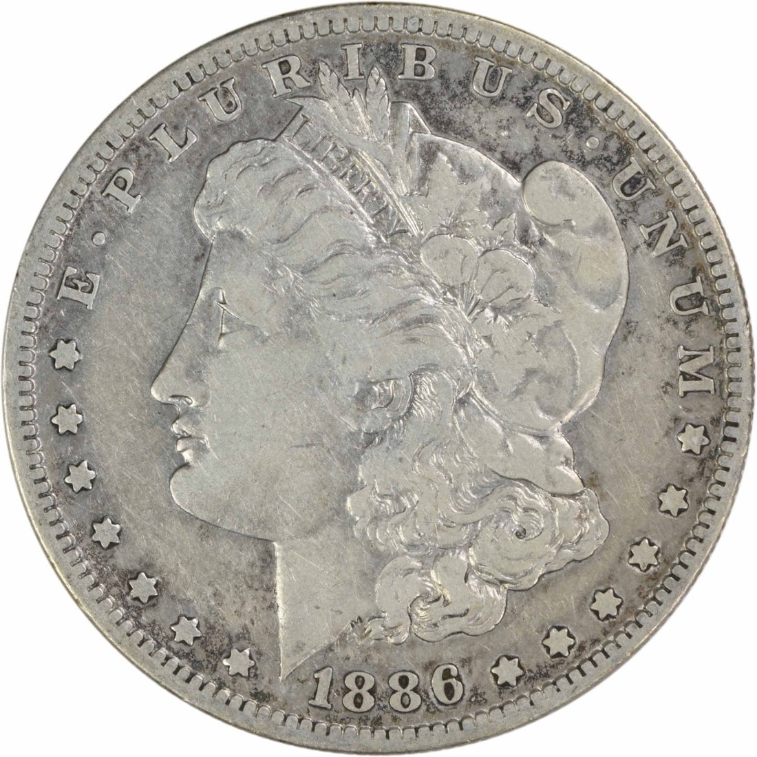 Uncertified VF 1886 S Morgan Silver Dollar: Uncertified VF 1886 S Morgan Silver Dollar The 1886 S Morgan Silver Dollar is a circulated example, bearing the distinctive San Francisco mint mark. With its 90% silver and 10% copper composition, thi