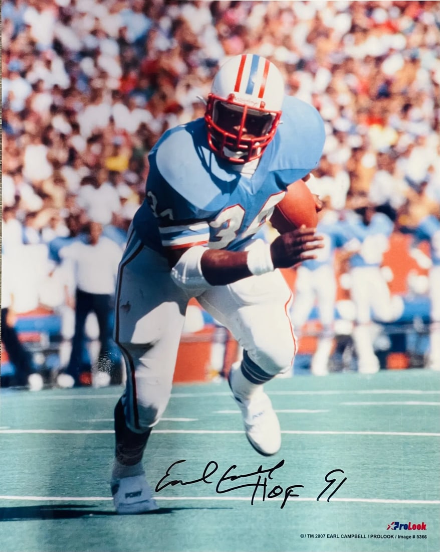 Campbell Earl Autographed Oilers 16x20 Photo JSA: Campbell Earl Autographed Oilers 16x20 Photo JSA Signed across the front in black sharpie, Earl Campbell's inscription "HOF 91" adds a personal touch to this 16x20 photo of the legendary running