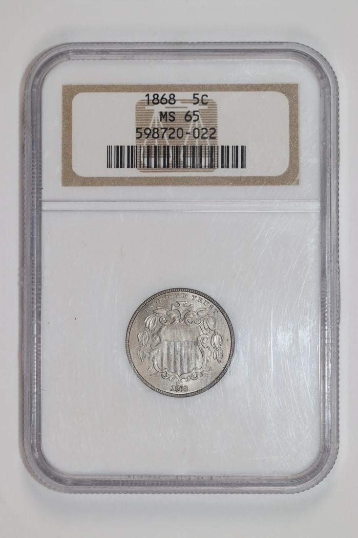 MS65 NGC Shield Nickel 1868: MS65 NGC Shield Nickel 1868 The MS65 NGC Shield Nickel 1868 boasts exceptional condition, with its uncirculated state showcasing pristine details. Certified by the Numismatic Guaranty Corporation (NGC