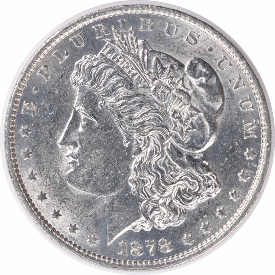 1878 Morgan Silver Dollar 7TF Reverse of 1879 AU Slider Uncertified: 1878 Morgan Silver Dollar 7TF Reverse of 1879 AU Slider Uncertified The 1878 Morgan Silver Dollar boasts an attractive AU slider, showcasing its condition and rarity. This circulated coin features the
